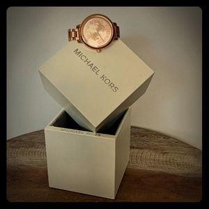 Rose gold Michael kors watch.